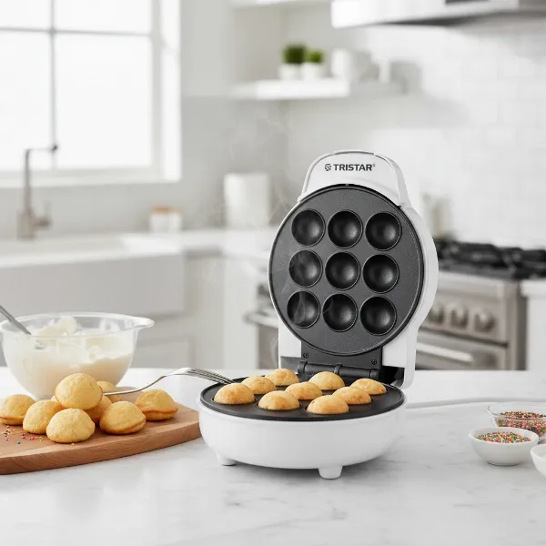 Tristar cake pop maker with fresh cake pops ready for decoration